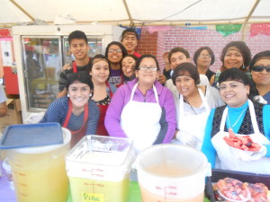 The parish youth group pitches in at the kermes.